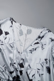 Lilafarbene, lässig bedruckte Patchwork-Kleider mit V-Ausschnitt und Plissee in Übergröße