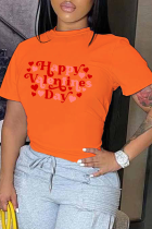 Oranje T-shirts met dagelijkse print en patchwork Letter O-hals