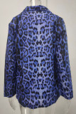Soprabito blu elegante con tasche patchwork leopardate e colletto risvoltato taglie forti