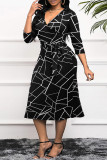 Zwarte casual print met riem V-hals bedrukte jurk Grote maten jurken