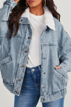 La giacca di jeans regolare a maniche lunghe con colletto rovesciato patchwork solido blu da cowboy