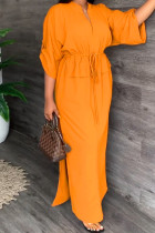 Orangefarbenes, lässiges, einfarbiges, langes Kleid mit Frenulum-Schlitz und V-Ausschnitt