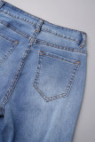 Blauwe straat effen gescheurde patchwork knopen split rits midden taille boot-cut denim jeans