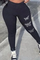 Schwarze, lässige Patchwork-Hose mit Hot Drill-Schmetterling und hoher Taille in Übergröße