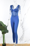 Blauwe sexy casual dagelijkse patchwork doorzichtige effen kleur skinny jumpsuits met spaghettibandjes