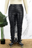 Pantalones negros informales de cintura alta con pliegues sólidos de talla grande