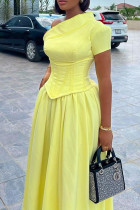 Желтые однотонные платья трапециевидной формы с косым воротником в стиле пэчворк