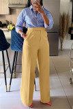 Calça casual sólida amarela terra com retalhos e bolso regular de cintura alta convencional de cor sólida