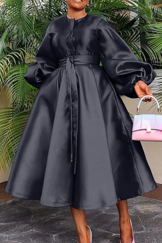 Robes noires décontractées à manches longues et col rond avec boucle en patchwork solide