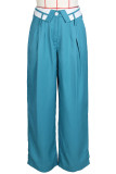 Pantalones rectos de cintura baja con botones de bolsillo y parches lisos elegantes azules