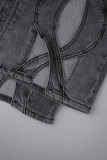 Jeans in denim larghi a vita alta con bottoni e tasche patchwork scavati neri solidi