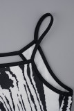Svart sexigt tryck urholkat rygglös slits spaghettiband långa klänningar