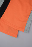 Tangerine Red Street Farbblock-Patchwork-Tasche, normale, niedrige Taille, konventionelle Patchwork-Hose