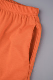 Tangerine Red Street Color Block Patchwork-ficka Vanlig låg midja Konventionella Patchwork-bottnar