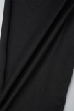 Zwarte skinny jumpsuits met patchwork en O-hals met straatkarakter