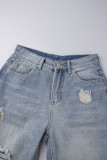 Jeans in denim regolari a vita media con bottoni e tasche patchwork strappati casual blu chiaro