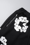 Bas droit imprimé streetwear avec poche zippée et fermeture éclair taille basse droite noir