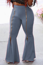 Pantalones de color liso con altavoz y cintura media con corte de bota y cremallera de retales lisos de Grey Street