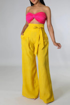 Bolsillo de parches lisos informal con lazo, pantalones sueltos de cintura alta, pierna ancha, color sólido, color amarillo
