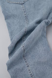 Lichtblauwe straat effen patchwork zakknopen rits skinny denim jeans met hoge taille