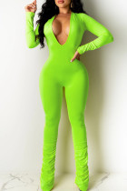 蛍光グリーンのセクシーなソリッドパッチワークVネックスキニージャンプスーツ