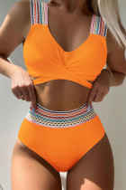Orangefarbene Patchwork-Bademode mit Sportswear-Print