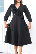 Schwarze, elegante, einfarbige Patchwork-Kleider mit Knöpfen und V-Ausschnitt in A-Linie