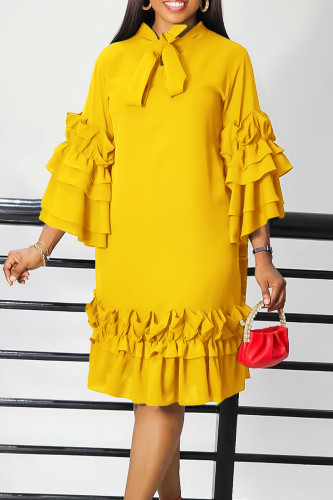 Gele elegante effen patchwork volant met rechte jurken met strik en O-hals