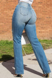 Hellblaue, zerrissene Patchwork-Jeans mit Taschen, Knöpfen, Reißverschluss und hoher Taille in Hellblau