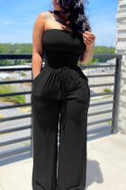 Black Sexy Solid Bandage Patchwork Pocket Strapless Loose Jumpsuits