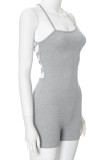 Grey Street - Barboteuse slim en patchwork uni dos nu avec bretelles croisées et col asymétrique