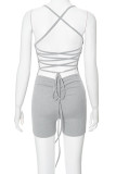 Grey Street Solid Patchwork Backless Cross Straps Asymmetrical Collar Skinny Rompers