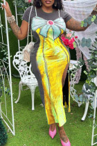 Vestidos de falda envueltos con cuello en O con abertura alta y patchwork con estampado dulce amarillo