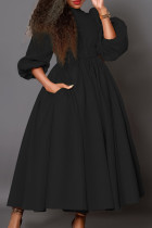Vestidos negros elegantes de retazos lisos con cinturón y cuello redondo