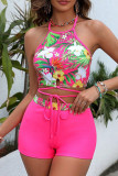 Pinke Sportswear-Badebekleidung mit ausgehöhlten Patchwork-Kreuzträgern und Blumenmuster (mit Polsterung)