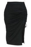 Jupe enveloppée noire élégante en patchwork solide avec ficelle à ouverture haute, grande taille