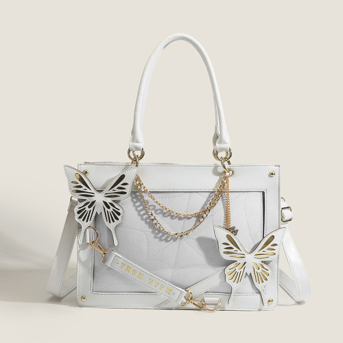 Bolsas brancas elegantes com correntes de borboletas