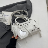 Rosa Vintage-Reißverschlusstaschen mit massiven Nieten