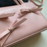 Roze zoete eenvoud effen met contrasterende tassen met strik