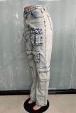 Babyblauwe, casual effen patchwork zak met knopen en ritssluiting, rechte denim jeans met middentaille