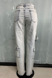 Babyblauwe, casual effen patchwork zak met knopen en ritssluiting, rechte denim jeans met middentaille