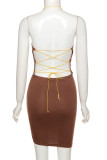 Brown Fashion Sexy Solid Hollowed Out Backless Halter Sling Dress