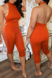 Tangerine Red Sexy Casual Solid Ripped Hollowed Out Backless O Neck Skinny Jumpsuits