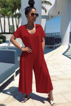 Red Fashion Sexy Solid Patchwork Polyester Short Sleeve V Neck Jumpsuits