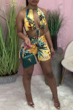 Yellow Fashion Sexy Print Backless Halter Skinny Romper