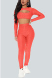 Orange Sexy Solid Hollowed Out O Neck Long Sleeve Two Pieces