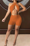 Yellow Sexy Solid Hollowed Out Backless Strap Design Halter Skinny Romper