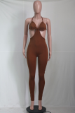 Pink Sexy Solid Hollowed Out Halter Skinny Jumpsuits