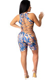Blue Sexy Hollow Asymmetrical Camouflage Backless Print Chemical fiber blend Sleeveless O Neck Rompers