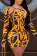 Orange Fashion Sexy Print Hollowed Out O Neck Skinny Rompers